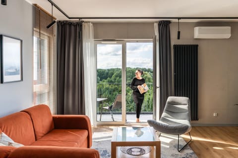 View (from property/room), Balcony/Terrace, Living room, Seating area, air conditioner
