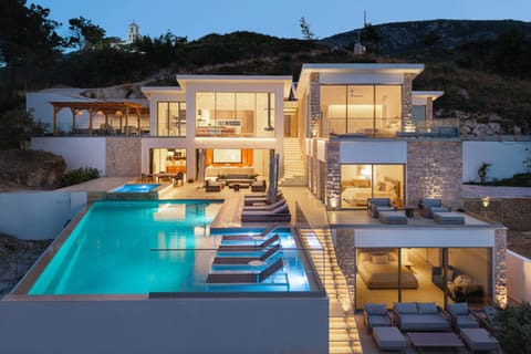 Property building, Patio, Night, Natural landscape, Mountain view, Pool view, Swimming pool, sunbed