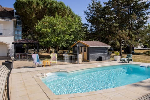 Property building, Living room, Swimming pool