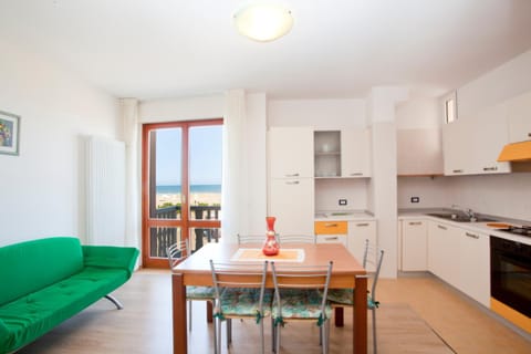 Kitchen or kitchenette, Living room, Dining area, Sea view