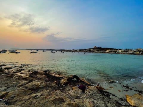 Nearby landmark, Natural landscape, Beach, Sunset