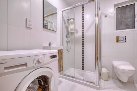 Shower, Toilet, Bathroom, Bath, towels, washing machine, dryer