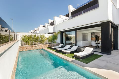 Property building, Living room, Swimming pool