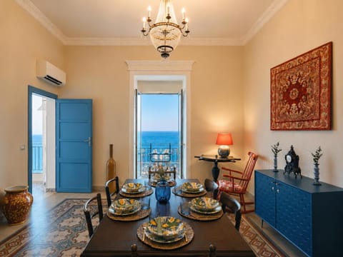 Natural landscape, Living room, Seating area, Dining area, Sea view