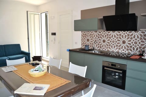 Kitchen or kitchenette, Living room, Dining area, oven, stove