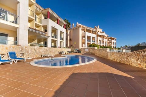 Property building, Balcony/Terrace, Pool view, Swimming pool, sunbed