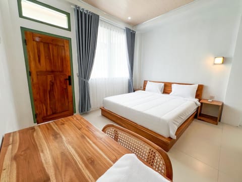 Bed, Seating area, Bedroom, towels, wardrobe