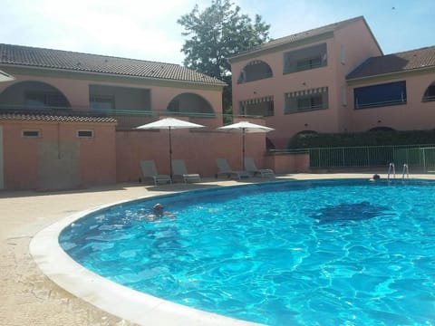 Property building, Living room, Swimming pool