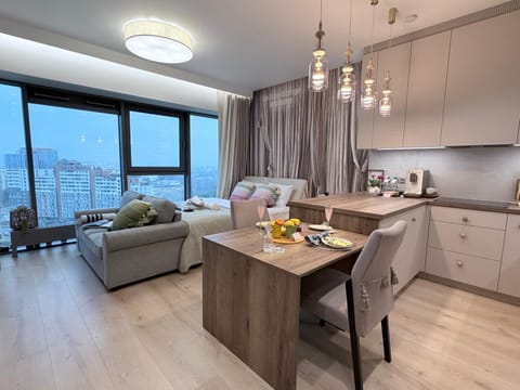 Kitchen or kitchenette, Living room, Seating area, Dining area