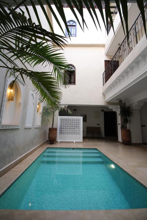 Property building, Patio, Day, Pool view, Swimming pool