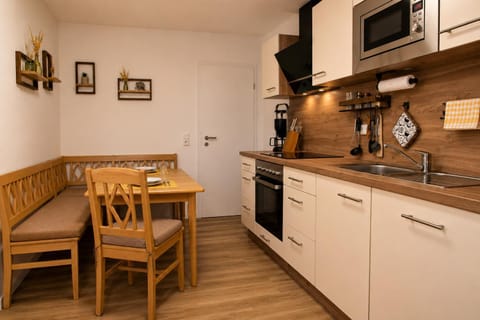 Seating area, dishwasher, microwave, kitchen