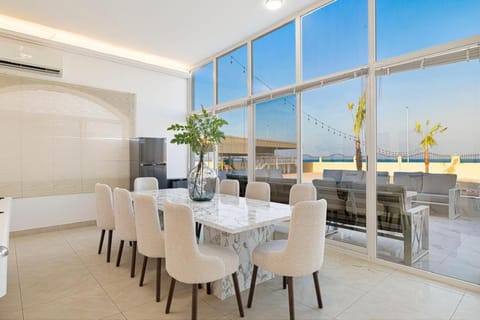View (from property/room), Balcony/Terrace, Living room, Seating area, Dining area, air conditioner