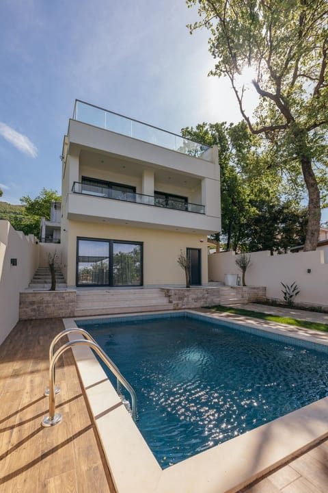 Property building, Patio, Pool view, Swimming pool