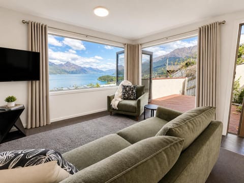 Natural landscape, View (from property/room), Living room, Seating area, Lake view, Mountain view
