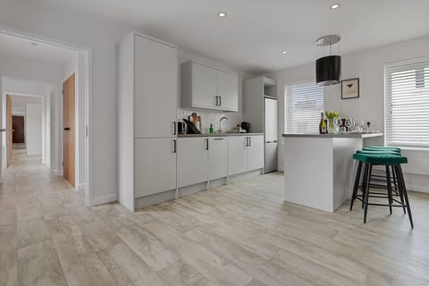 Dining area, dishwasher, internet, microwave, oven, stove, toaster, washing machine