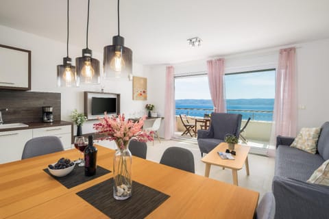 Natural landscape, Living room, Seating area, Dining area, Sea view