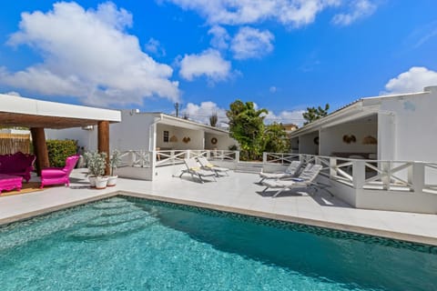 Property building, Patio, Day, Natural landscape, Balcony/Terrace, Seating area, Pool view, Swimming pool, sunbed