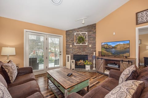 TV and multimedia, Living room, Seating area, fireplace, furniture