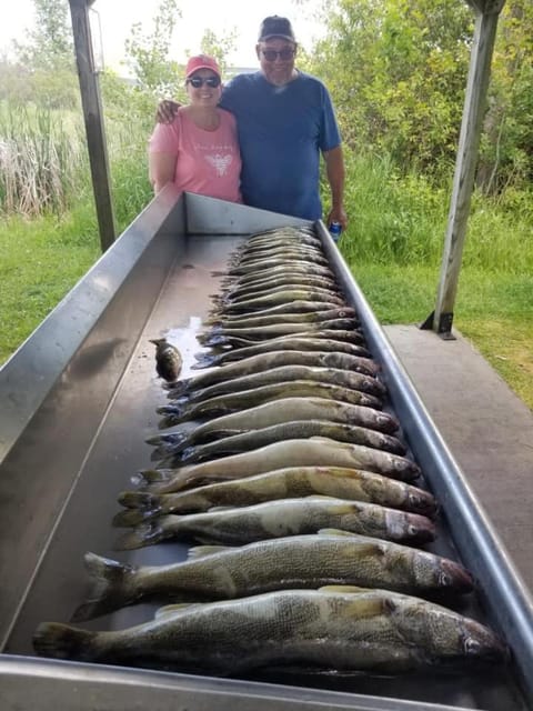 AuGres Walleye Assassin Charters Docked boat in Au Gres