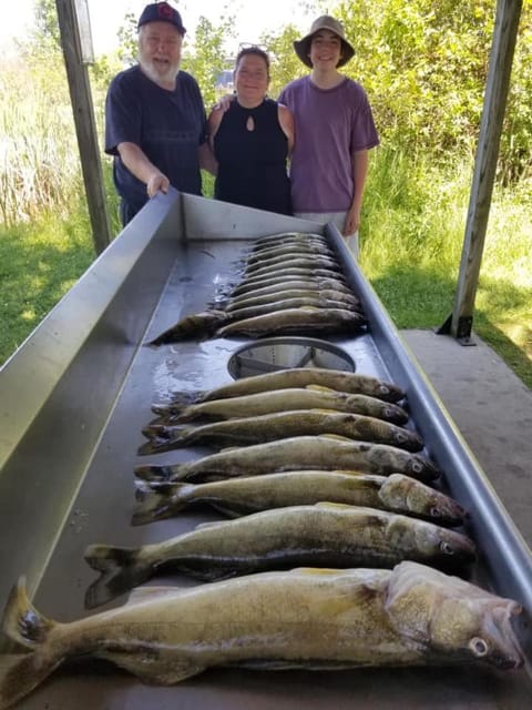AuGres Walleye Assassin Charters Docked boat in Au Gres