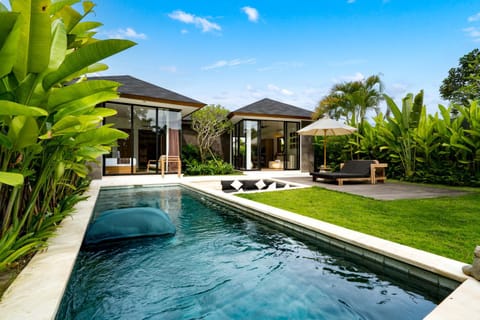 Property building, Seating area, Pool view, Swimming pool, sunbed