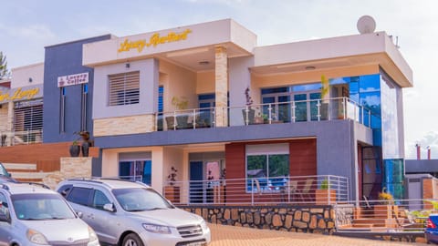 Property building, Balcony/Terrace, Lobby or reception, Breakfast