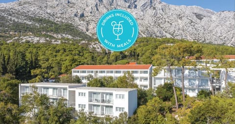 Property building, Nearby landmark, Day, Natural landscape, Mountain view