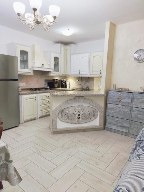 Kitchen or kitchenette, dishwasher, stove