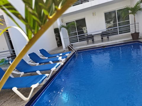 Swimming pool, sunbed