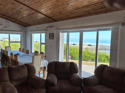 Natural landscape, Living room, Seating area, Dining area, Sea view