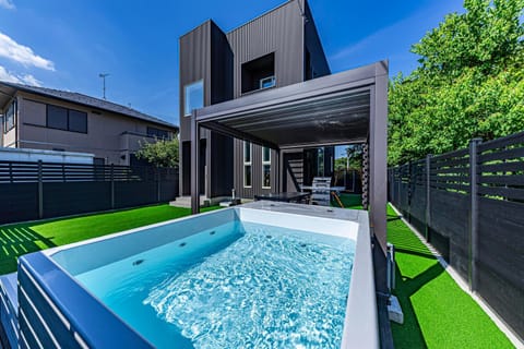 Property building, Day, Natural landscape, Pool view, Swimming pool