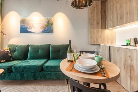 Kitchen or kitchenette, Living room, Seating area, Dining area