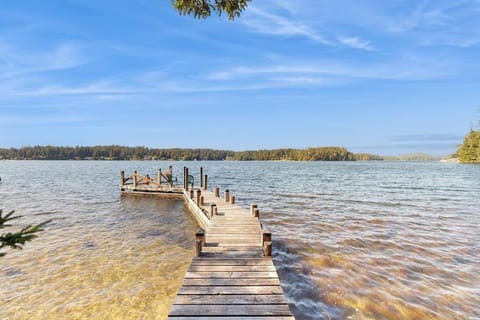 Unique lakefront cabin near the dunes with a private dock & fireplace Cabin in Dunes City