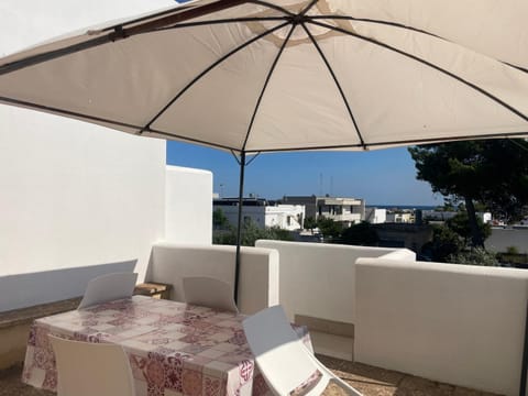 Property building, Patio, Day, Natural landscape, View (from property/room), Balcony/Terrace, Seating area, Dining area, Sea view