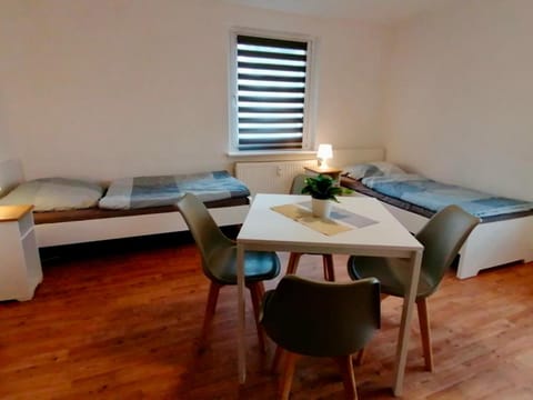 Bed, Seating area, Dining area, Bedroom