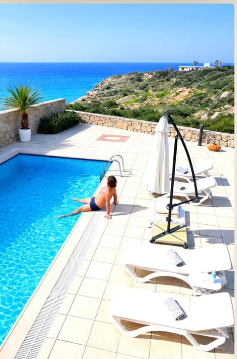 Patio, Natural landscape, View (from property/room), Pool view, Sea view, Swimming pool, sunbed
