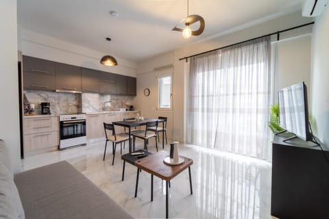 Kitchen or kitchenette, Living room, Seating area, Dining area