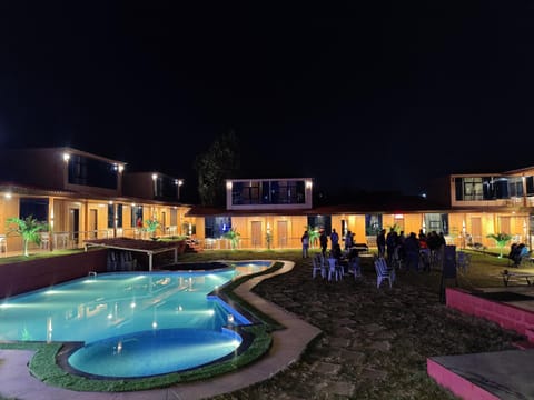 Property building, Night, Pool view, Swimming pool