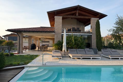 Property building, Pool view, Swimming pool, sunbed