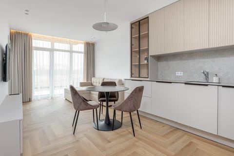 Kitchen or kitchenette, Living room, Seating area, Dining area, stove