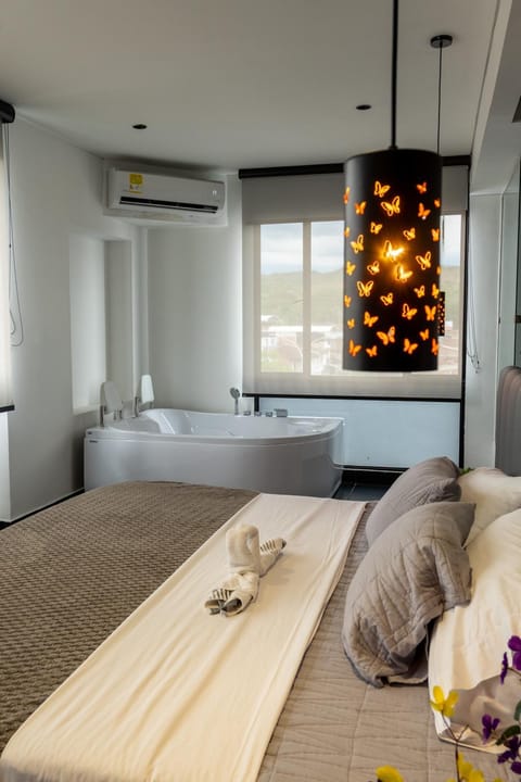 Bed, Photo of the whole room, Bedroom, towels, air conditioner