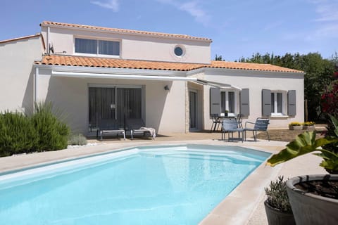 Property building, Living room, Swimming pool