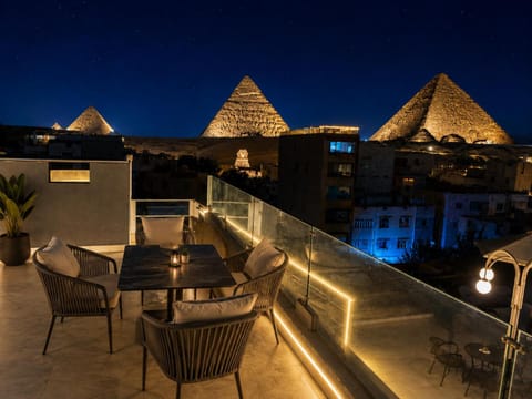 Property building, Patio, Night, View (from property/room), Balcony/Terrace