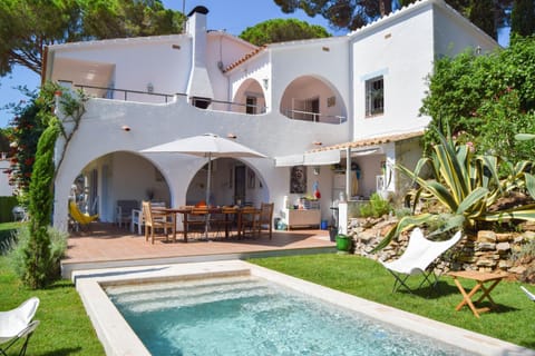 Property building, Living room, Swimming pool