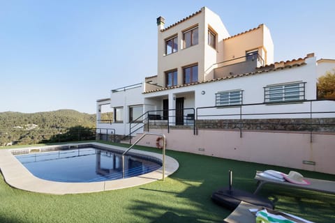 Property building, Living room, Swimming pool
