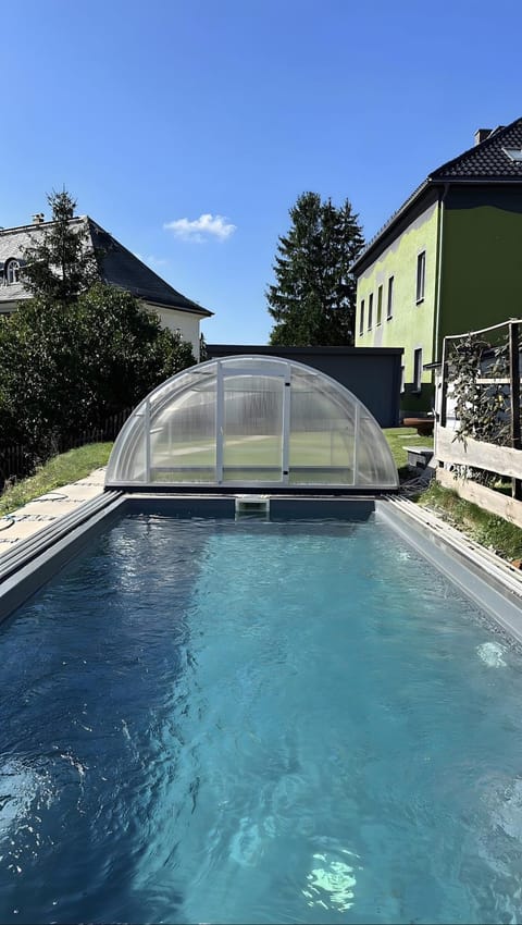 Property building, Living room, Swimming pool