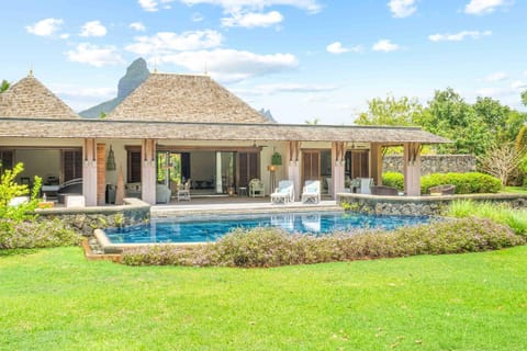 Property building, Patio, Garden, Swimming pool, sunbed