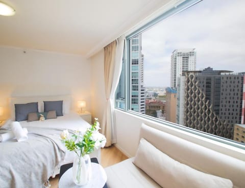 View (from property/room), Living room, Seating area, Bedroom