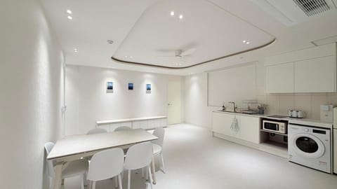 Kitchen or kitchenette, Dining area, toaster, washing machine, dryer