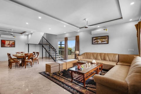 Communal lounge/ TV room, Living room, Seating area, air conditioner